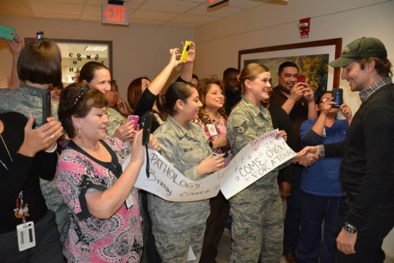 BAMC employees from the Pathology department greet Bradley Cooper Jan. 14 at San Antonio Military Medical Center. (Photo by Robert Shields)