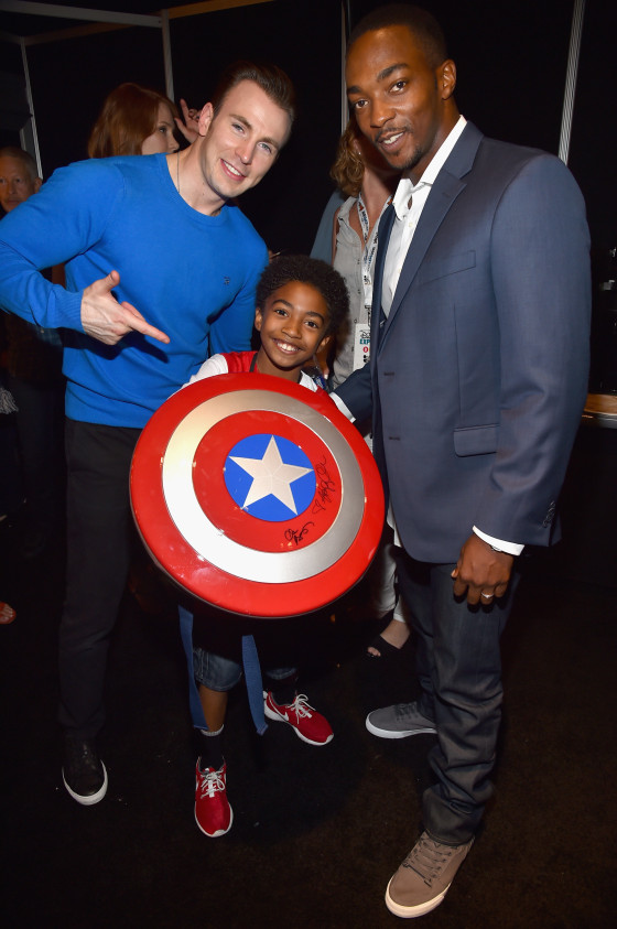 ANAHEIM, CA - AUGUST 15: (L-R) Actor Chris Evans of CAPTAIN AMERICA: CIVIL WAR, actor Miles Brown and actor Anthony Mackie of CAPTAIN AMERICA: CIVIL WAR took part today in "Worlds, Galaxies, and Universes: Live Action at The Walt Disney Studios" presentation at Disney's D23 EXPO 2015 in Anaheim, Calif. (Photo by Alberto E. Rodriguez/Getty Images for Disney) Local Caption *** Chris Evans; Miles Brown; Anthony Mackie